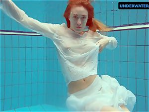 red-haired Diana steamy and naughty in a white sundress