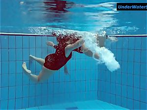 two super-hot teenagers underwater